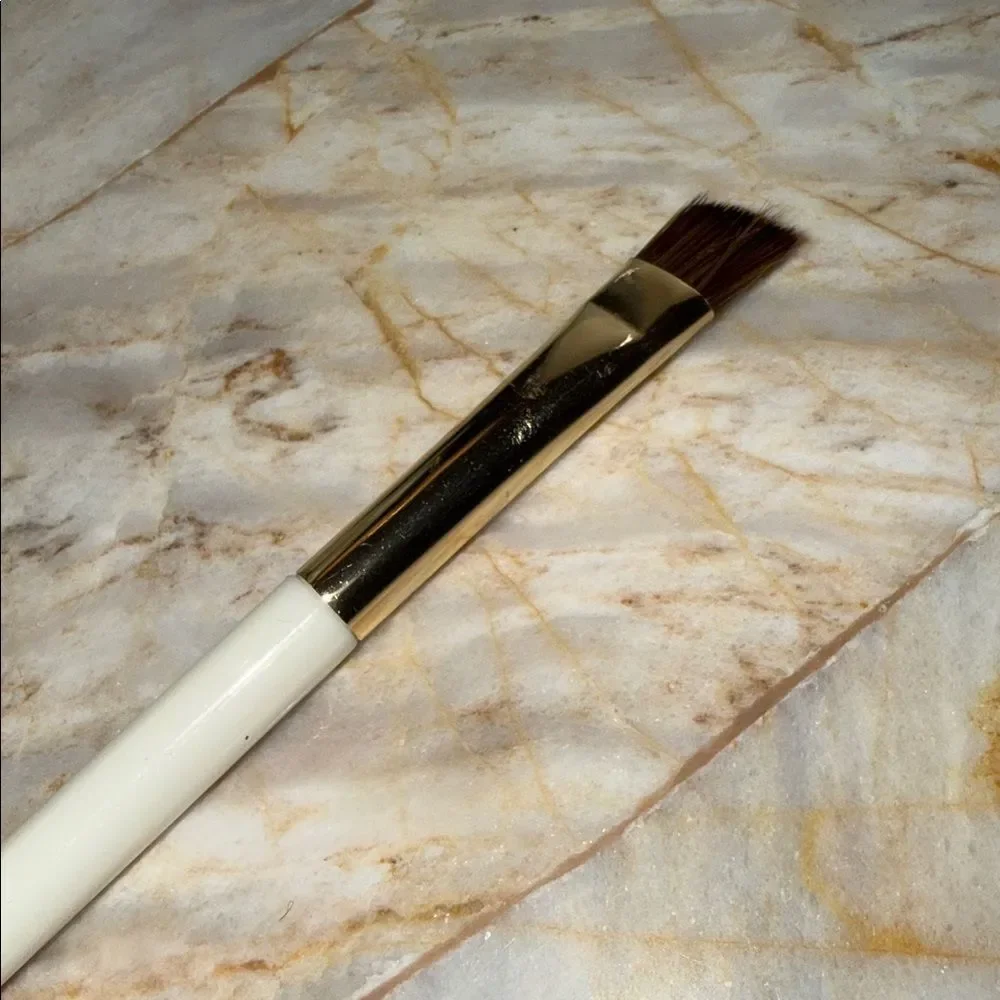White Makeup Brush with Gold Accent